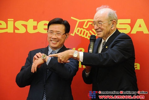 Mr. Liang Wengen and Mr.Schlecht exchanged their watches